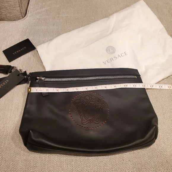Brand new Versace leather clutch wrislet